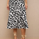 Cargar imagen en el visor de la galería, Falda MIDI satinada animal print
